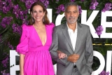 Julia Roberts showed up to an event honoring George Clooney in a dress that had the actor’s face all over it