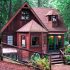 Meet ‘Dreamcatcher’ — the rustic forest cabin with a surprise on the back patio