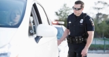 Why Police Officers Tap Your Car’s Tail Light When Stopping You in Traffic